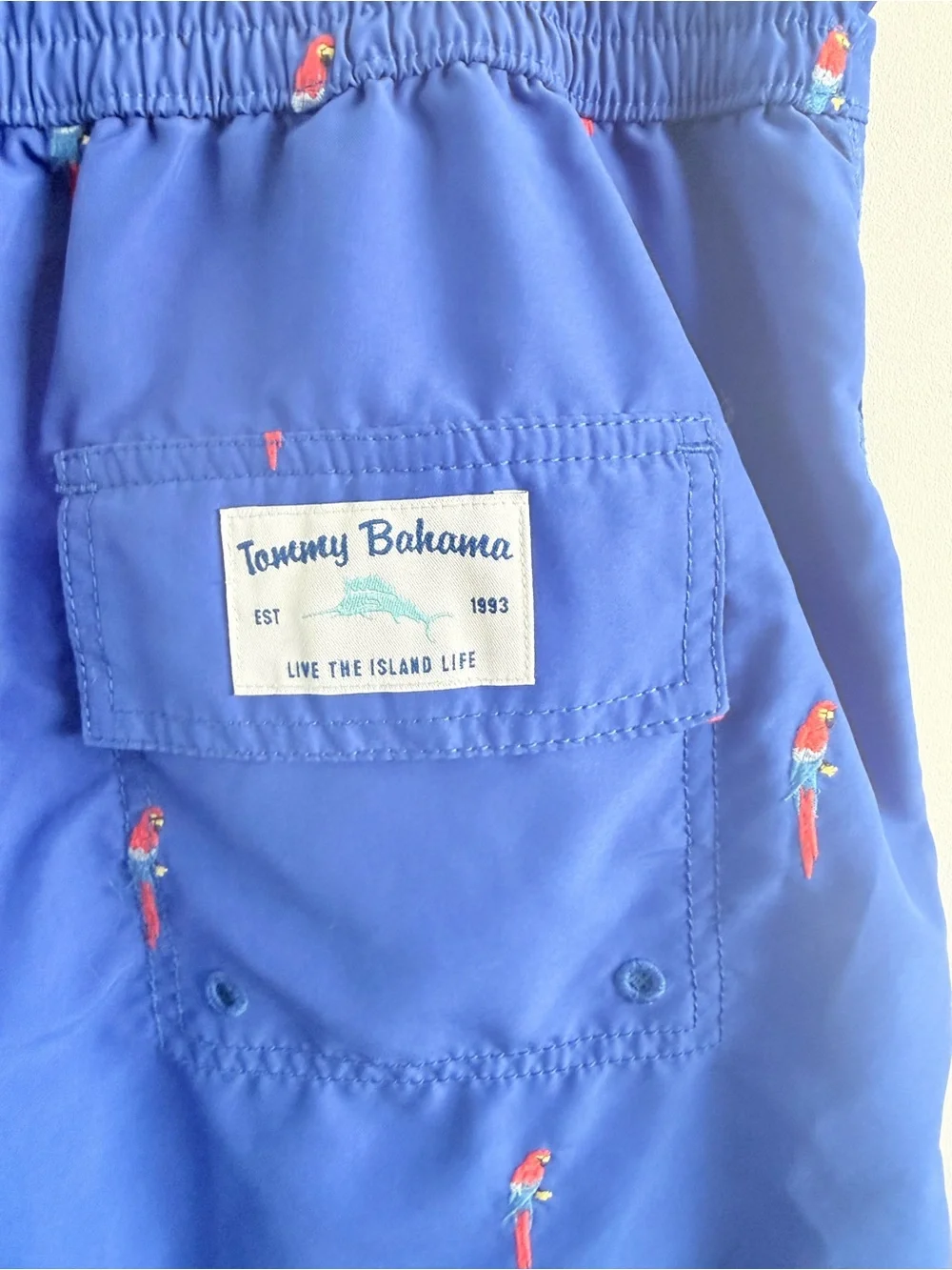 Tommy Bahama Blue Swim Trunks with Red Parrot Embroidery